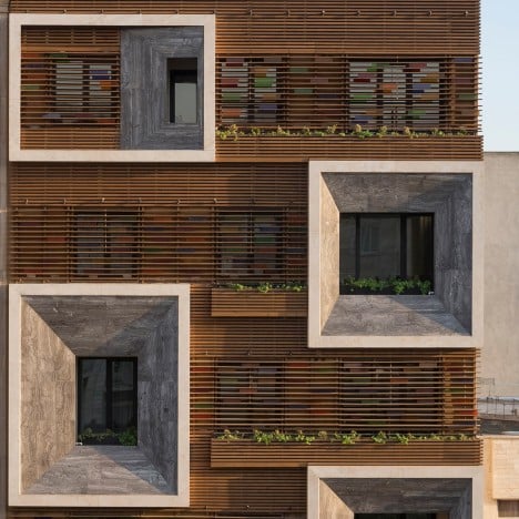 Tehran apartment block by Keivani Architects features faceted window frames and stained glass
