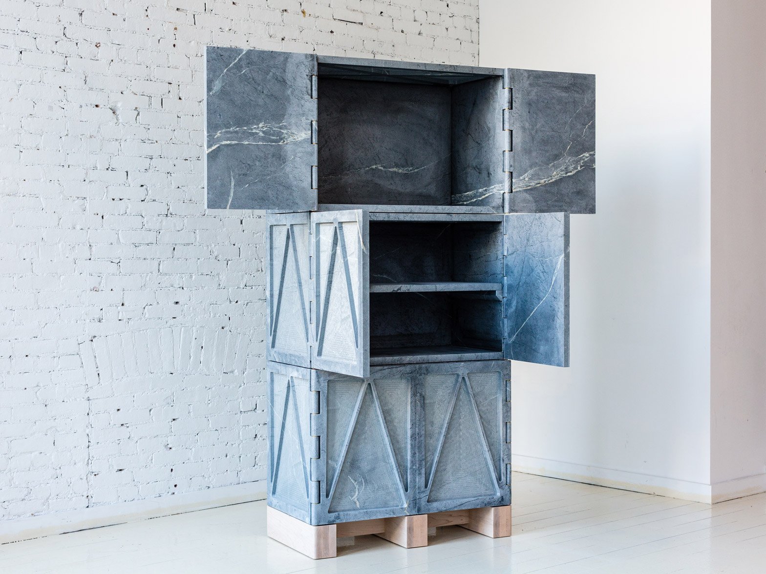 https://static.dezeen.com/uploads/2016/05/relief-stone-cabinet-six-door-qualities-of-material-fort-standard-furniture-new-york-design-week-2016_dezeen_soc_0.jpg