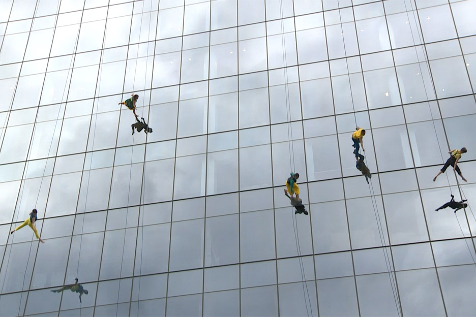 Mid-air dancing performance on the side of 100 North Avenue in Boston, Massachusetts, USA by Bandaloop