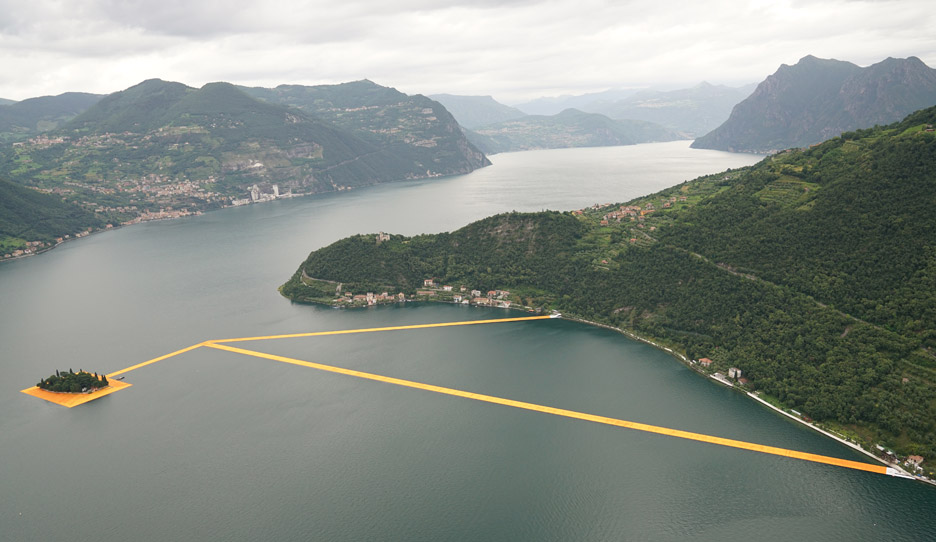 The Floating Piers project by Christo features bright orange pathways across Italy's Lake Iseo