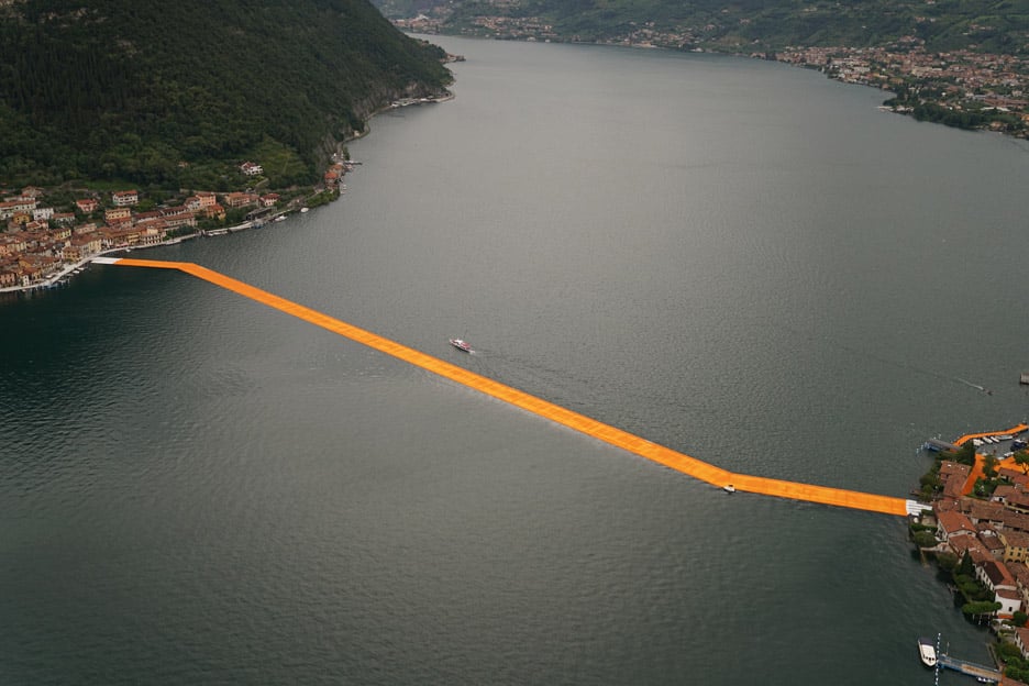 The Floating Piers project by Christo features bright orange pathways across Italy's Lake Iseo