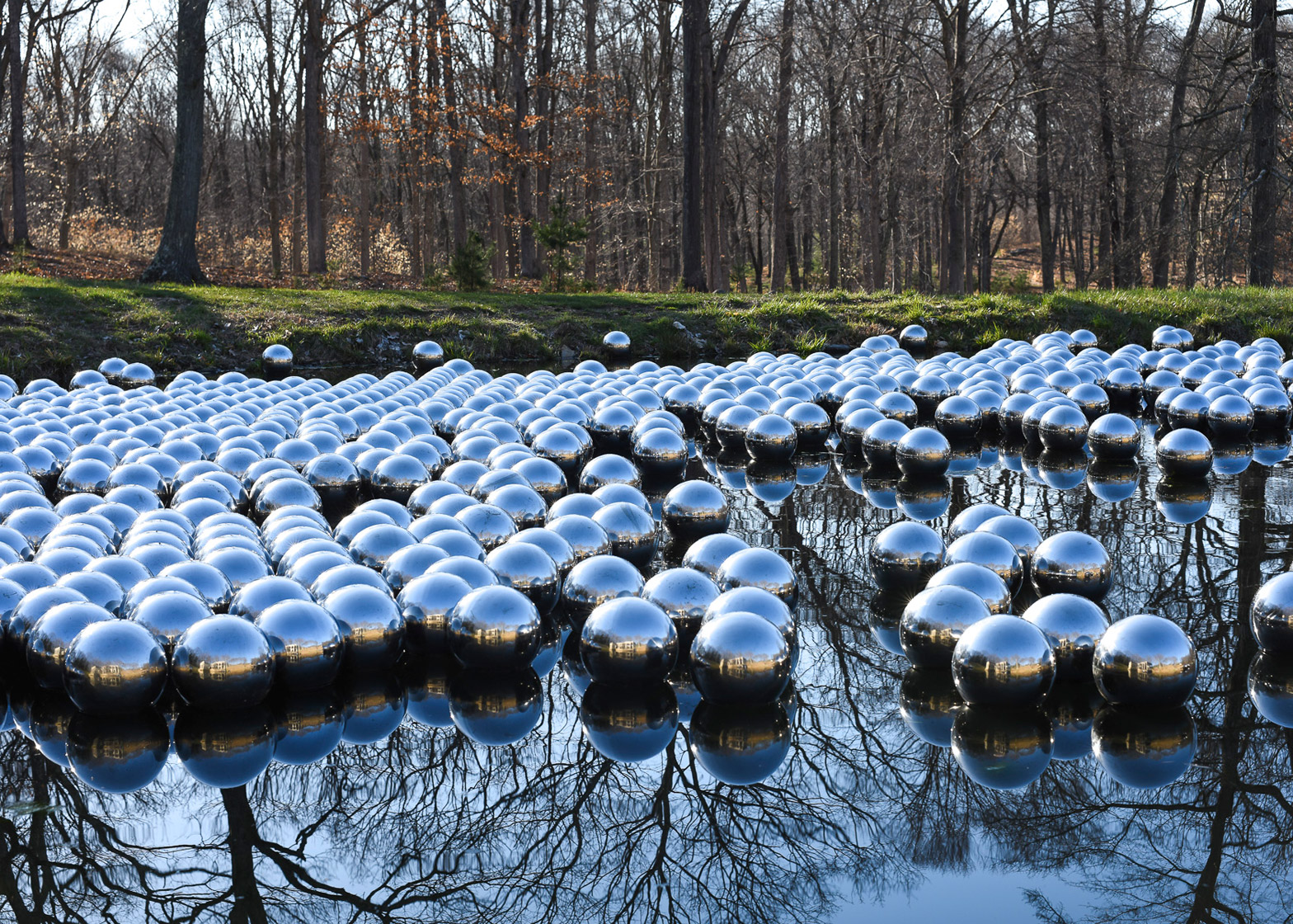 Yayoi Kusama's Narcissus Garden installation at Philip Johnson's Glass House estate in Connecticut
