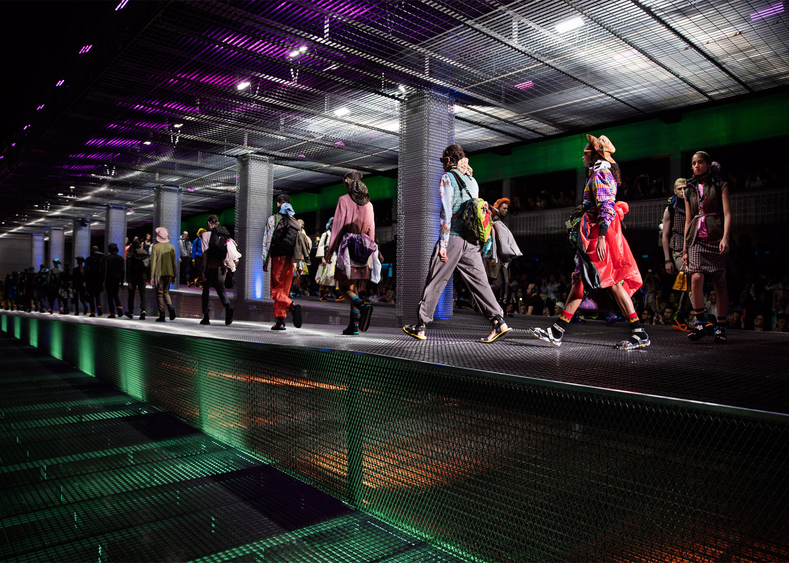 Satire eksplicit middag AMO's installs sloping mesh catwalks for Prada fashion show