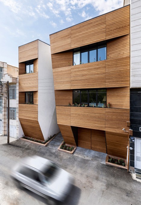 Afsharian's House by ReNa Design has a huge vertical slice in its facade