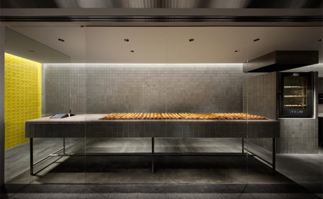 Yota Kakuda creates tiled interior for cheese tart store in Japan