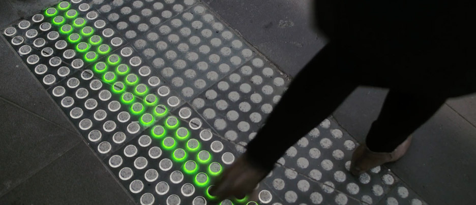 Büro North proposes traffic lights in the pavement to prevent accidents involving smartphone uses