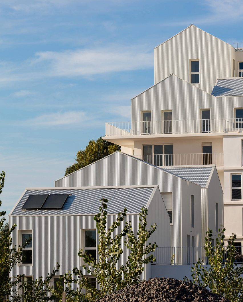 Gabled penthouses sit atop apartment blocks at Bordeaux housing scheme