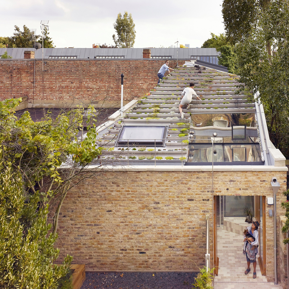 Hayhurst and Co creates "hanging-basket roof" for designers' home and studio