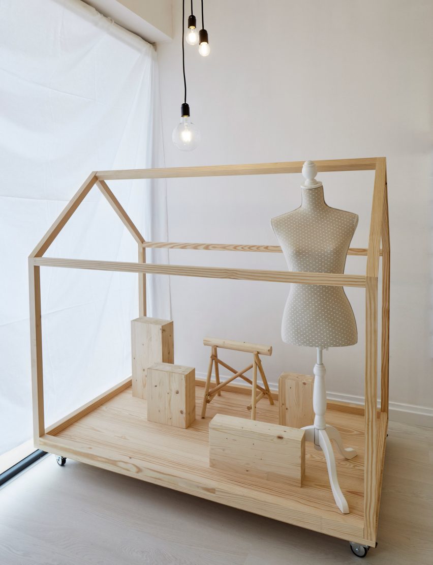 Bruno Lucas Dias adds timber skeleton to Portuguese accessories boutique