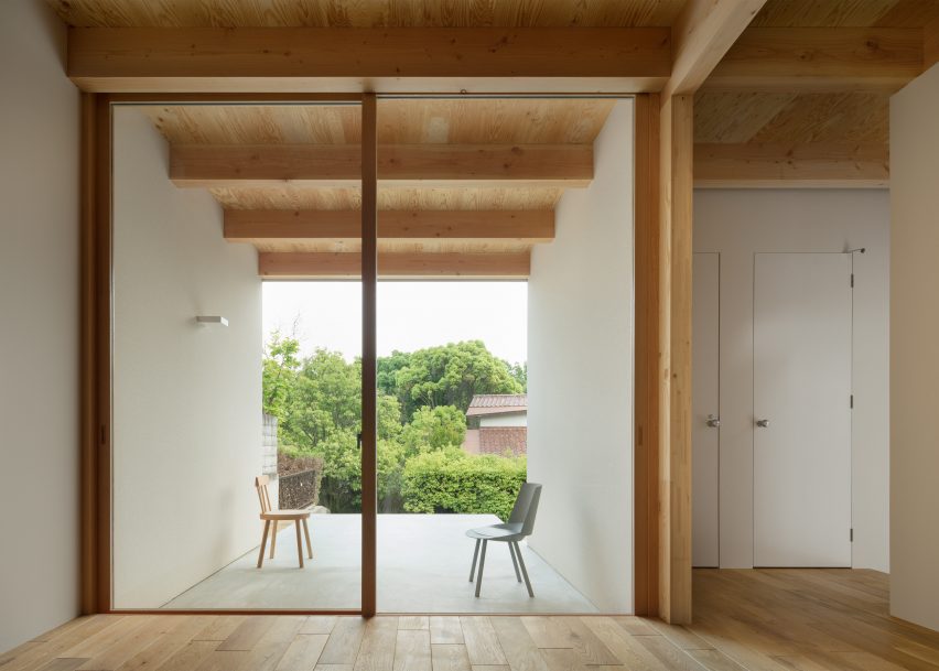 House In Mikage Contrasts White Surfaces With Exposed Wooden