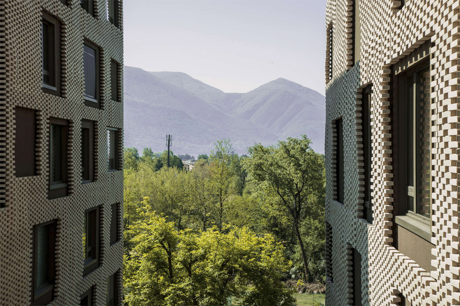 Brick "pixel patchwork" envelops Residenza Le Stelle housing by Buzzi Studio Di Architettura