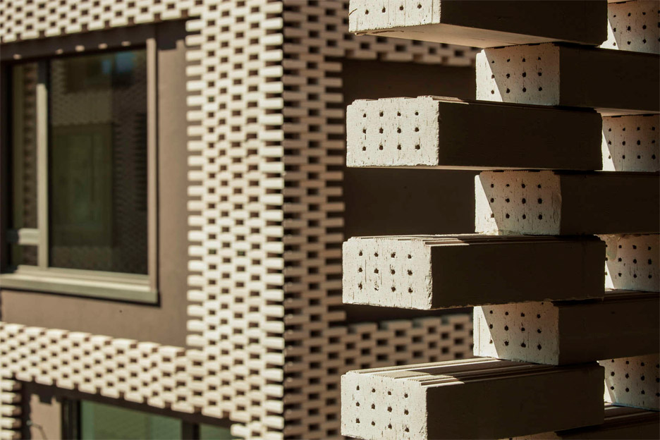Brick "pixel patchwork" envelops Residenza Le Stelle housing by Buzzi Studio Di Architettura