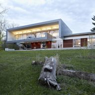 Studio Dwell embeds River View House into a sloped site in Illinois