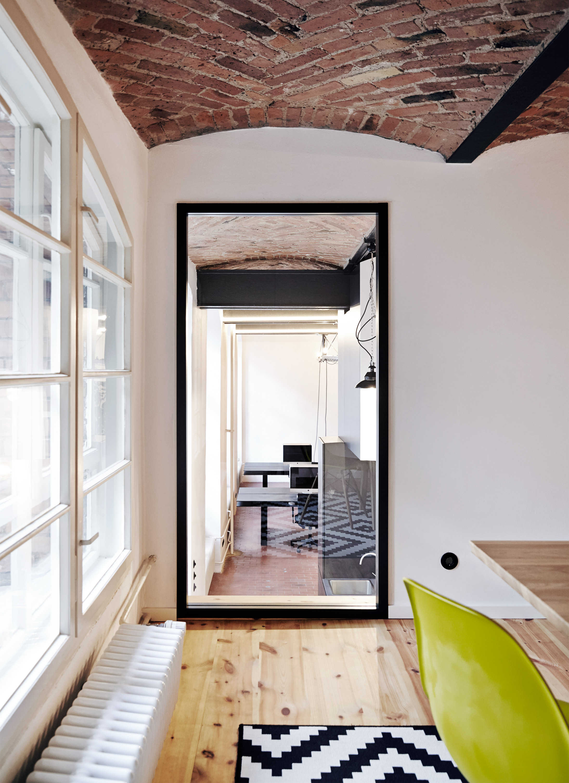IFUB transforms former chocolate factory into office with secret storage