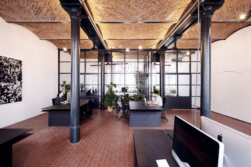 IFUB transforms former chocolate factory into office with secret storage