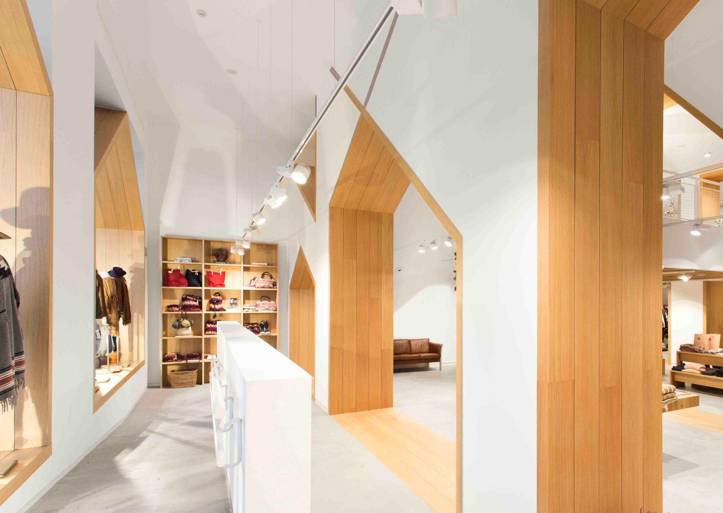 Pauzarq adds house-shaped archways to Sketch concept store in Spain