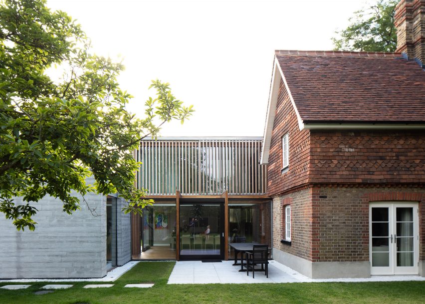 McGarry-Moon Architects adds concrete, timber and glass extension to a traditional gatehouse