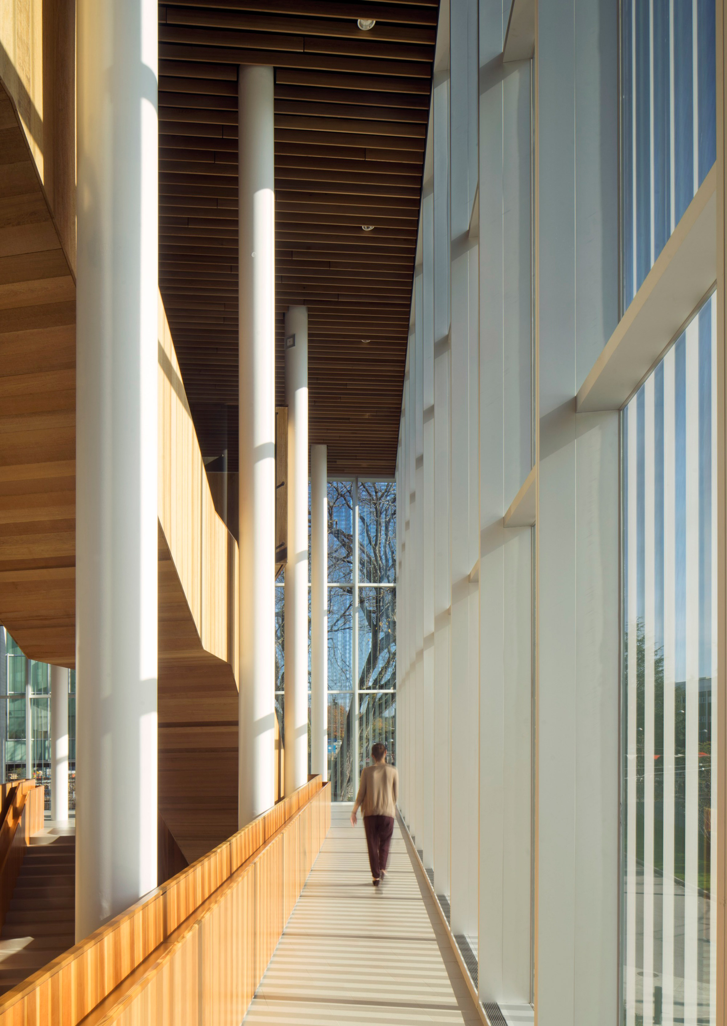 Vancouver university building by KPMB features fritted glass and rough-sawn cedar
