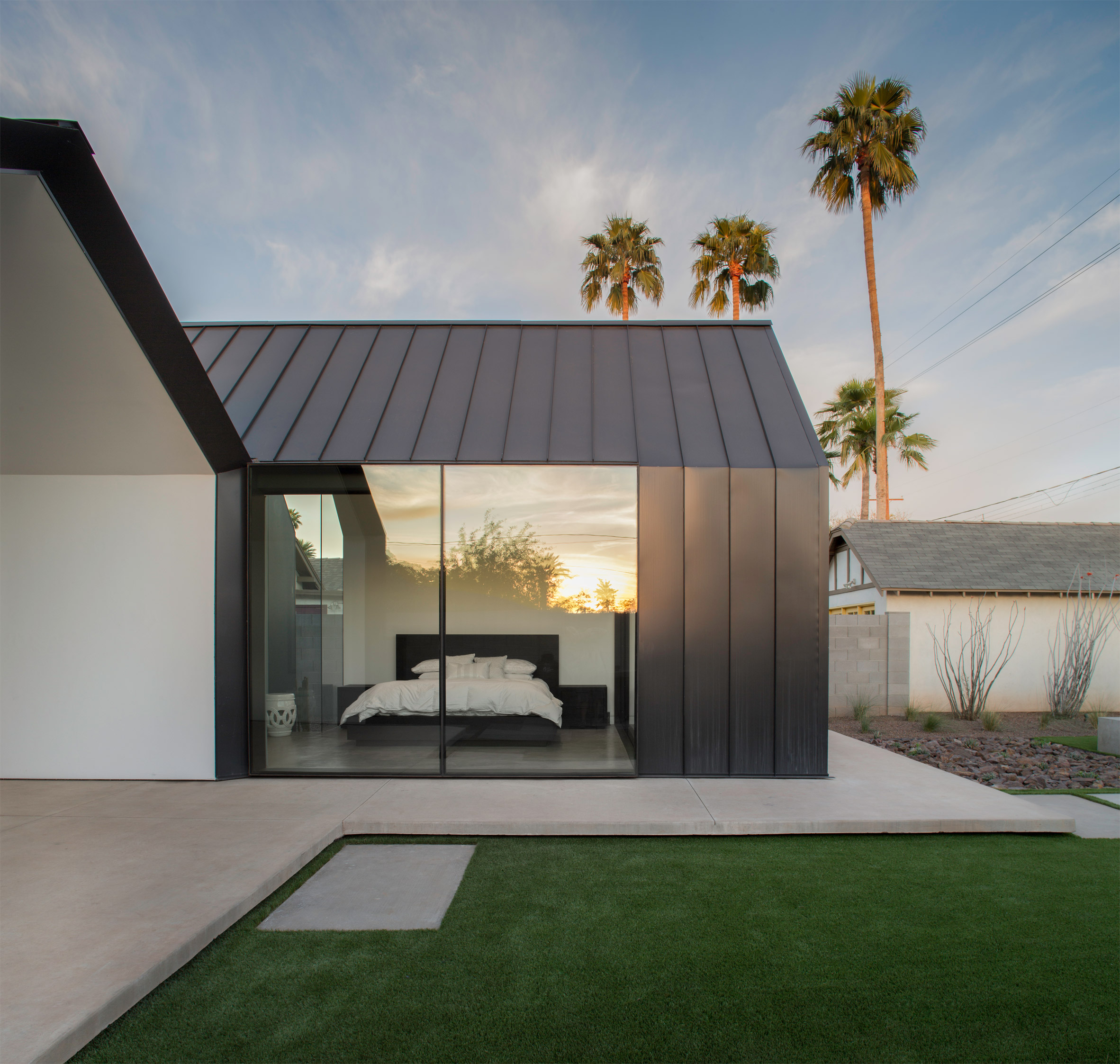 Chen + Suchart creates a gabled addition clad in metal for an historic Arizona home