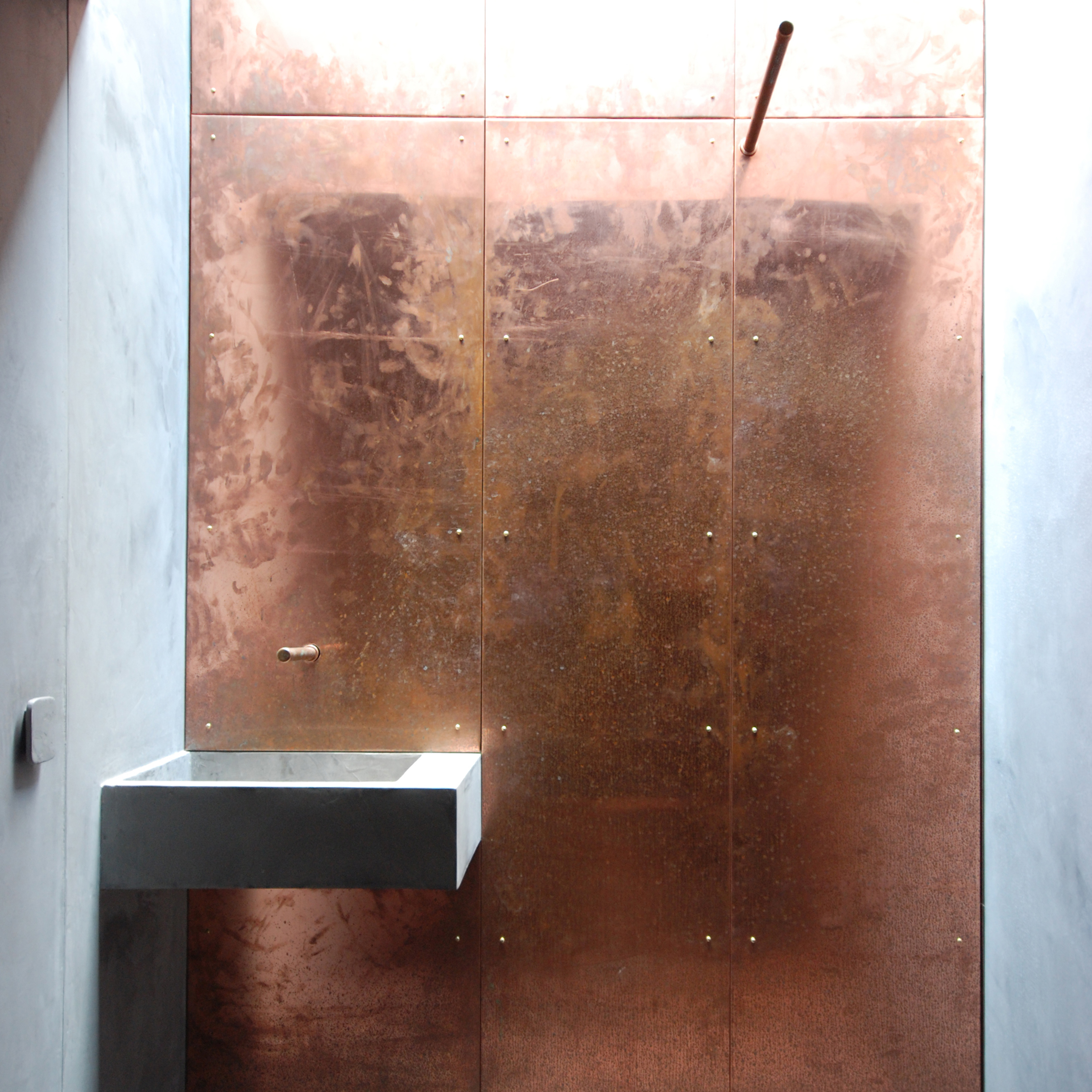 Copper clad studio by Stonewood features in Dezeen's Pinterest bathroom roundup