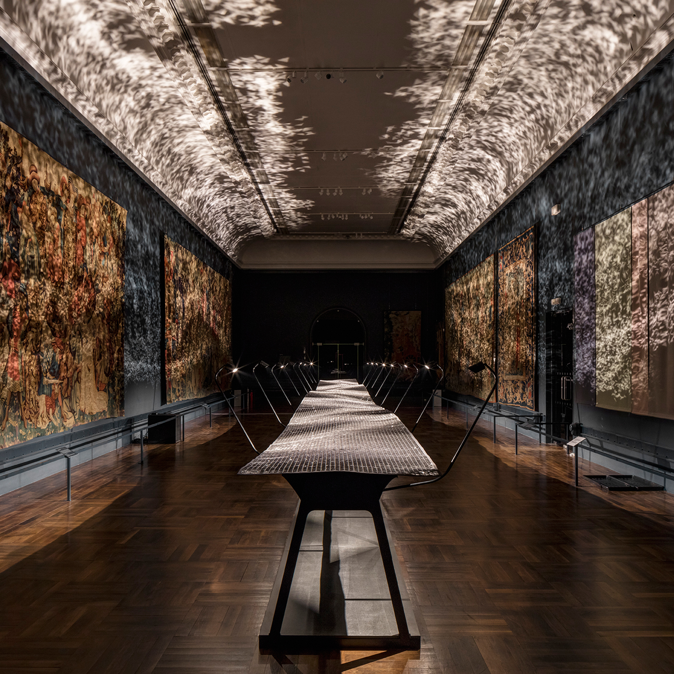 Benjamin Hubert fills V&A's medieval tapestry room with rippling light installation