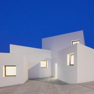 Four angular white volumes form house in Mallorca by OHLAB