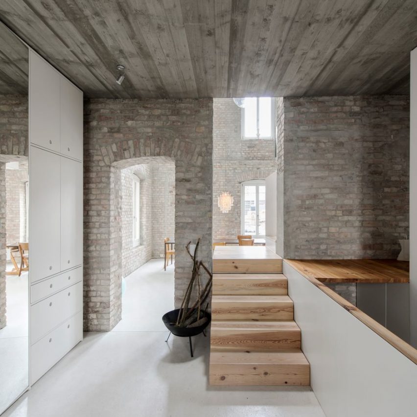 Asdfg Architekten converts former miller's house into contemporary home
