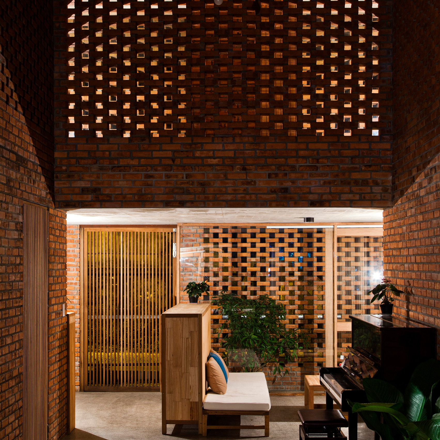 Perforated brick house by Tropical Space on the top 10 brick interiors on Dezeen's Pinterest boards