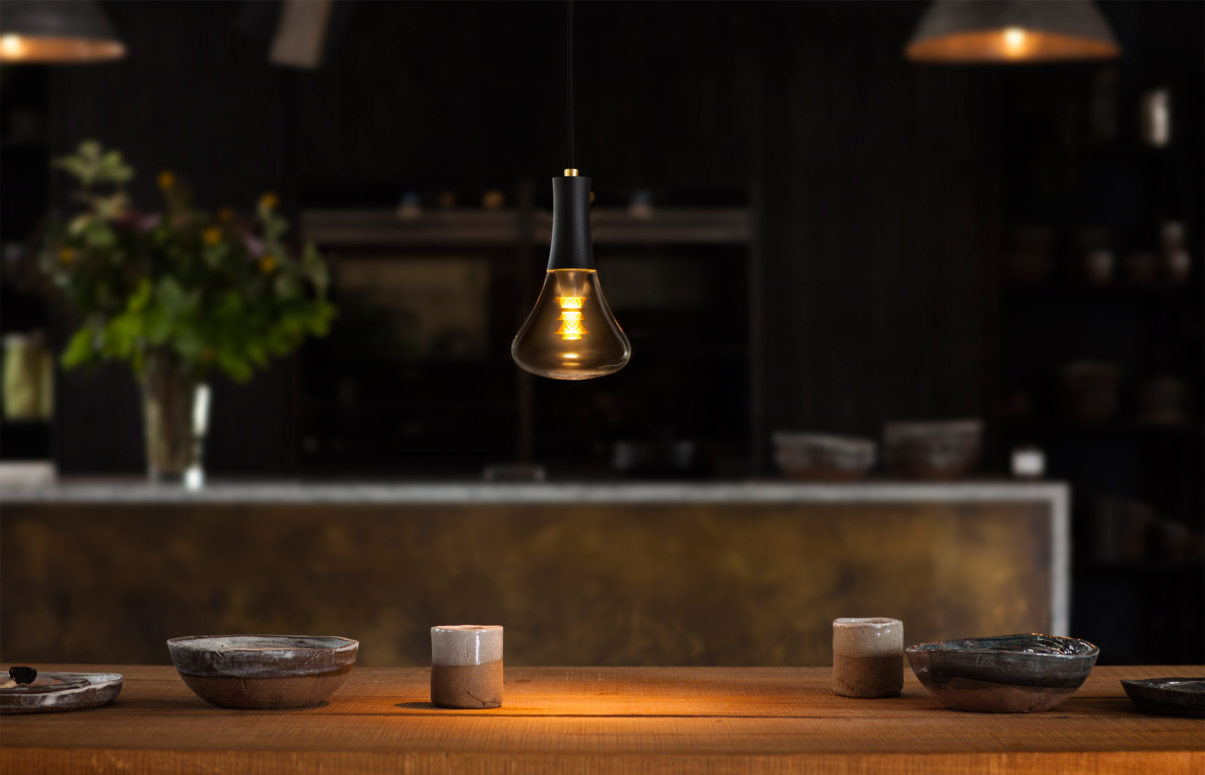 Plumen designs bulb with faceted gold internal shade