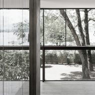 Villa Le Lac is a glass-walled house overlooking Lake Geneva