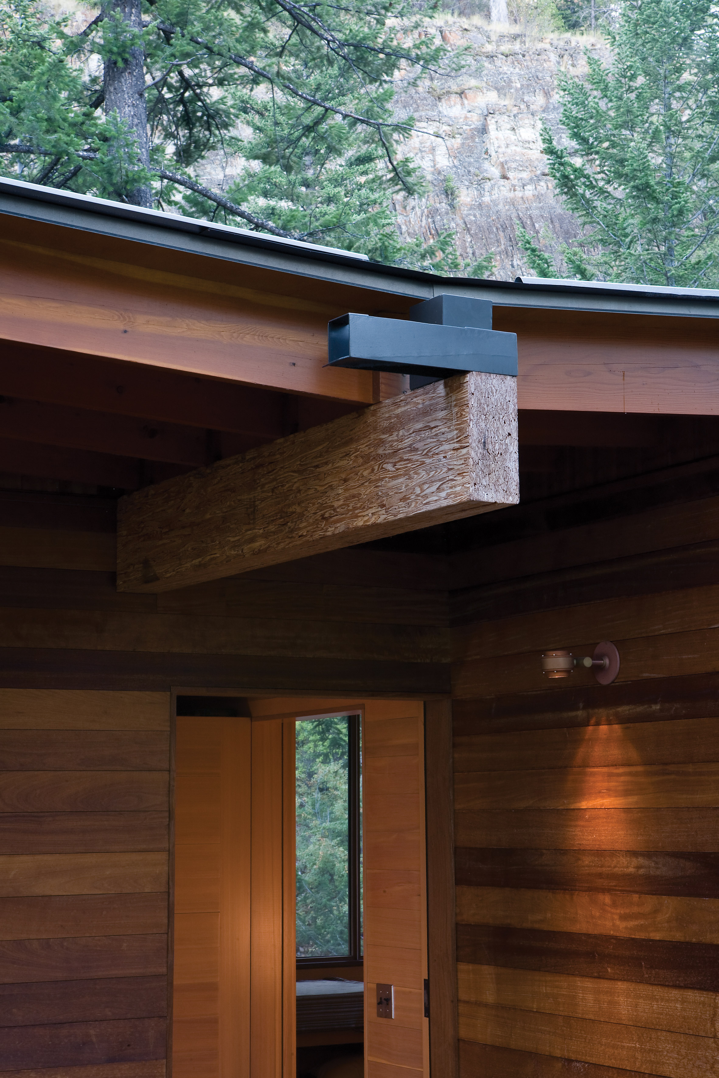 Rural Montana Cabin Is Built On A Granite Cliff Over Flathead Lake