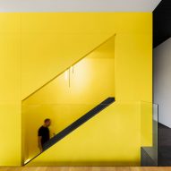 Naturehumaine adds sculptural black and yellow staircase to historic Montreal home