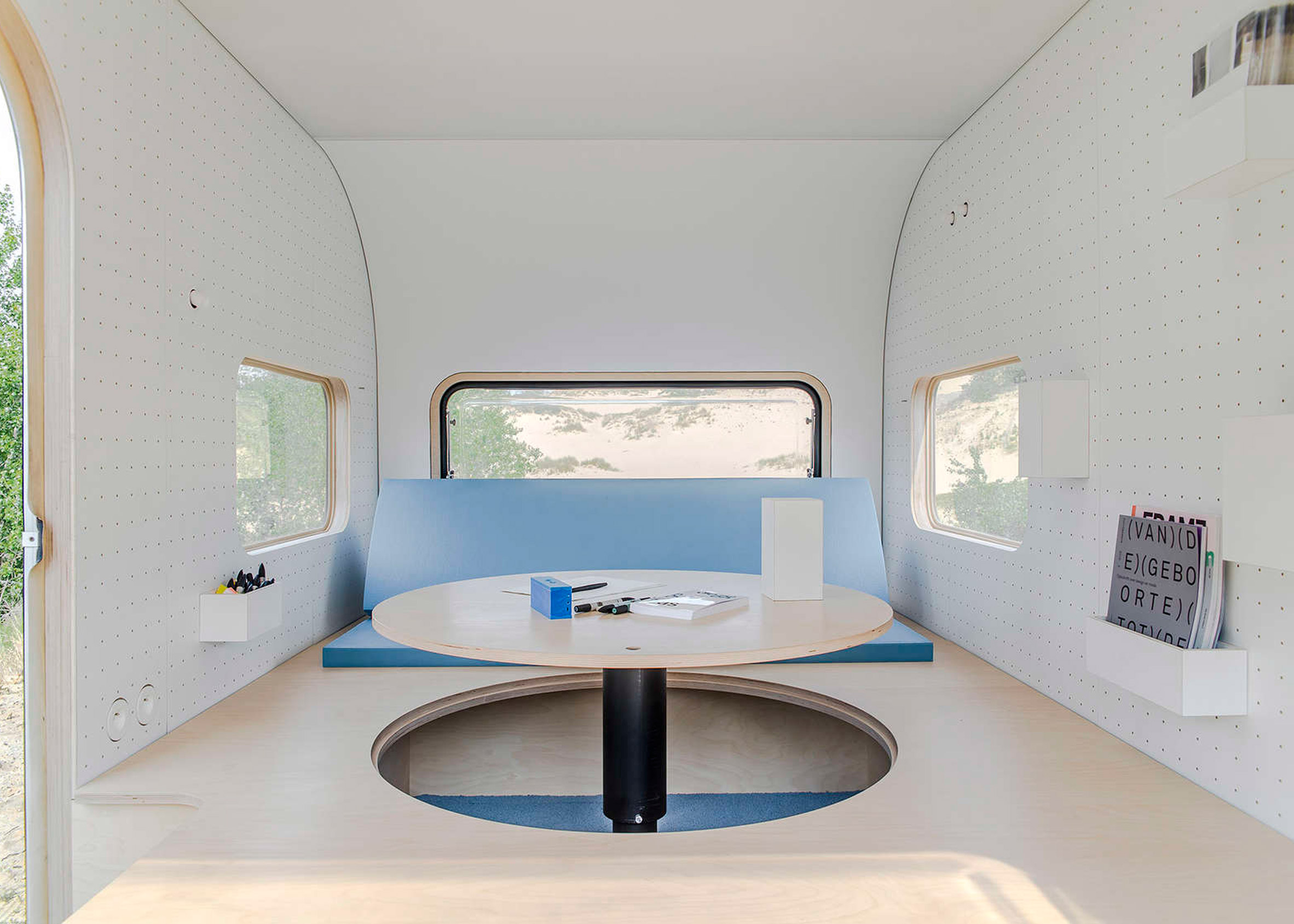 Five Am Turns Caravan Into Studio With Pop Up Table And Pegboard Walls