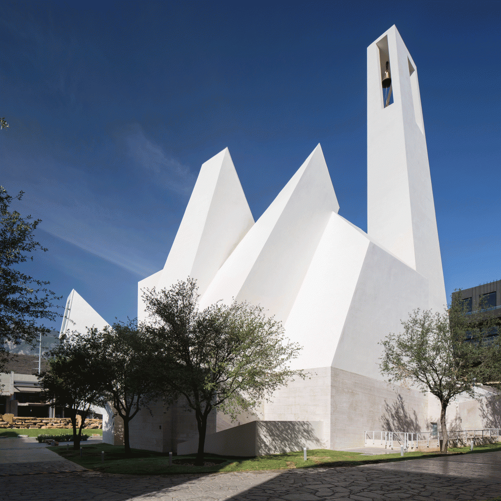 Crystalline church by Moneo Brock sits against a mountainous backdrop in  Monterrey