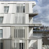 Sliding shutters cover Dietmar Feichtinger Architectes' Parisian apartments