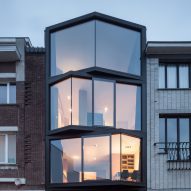 Angled glazing frames range of views from Ghent house by Miass Architecture and Steven Vandenborre