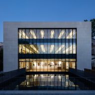 Walters & Cohen combines fluted stone and glass at London's American School