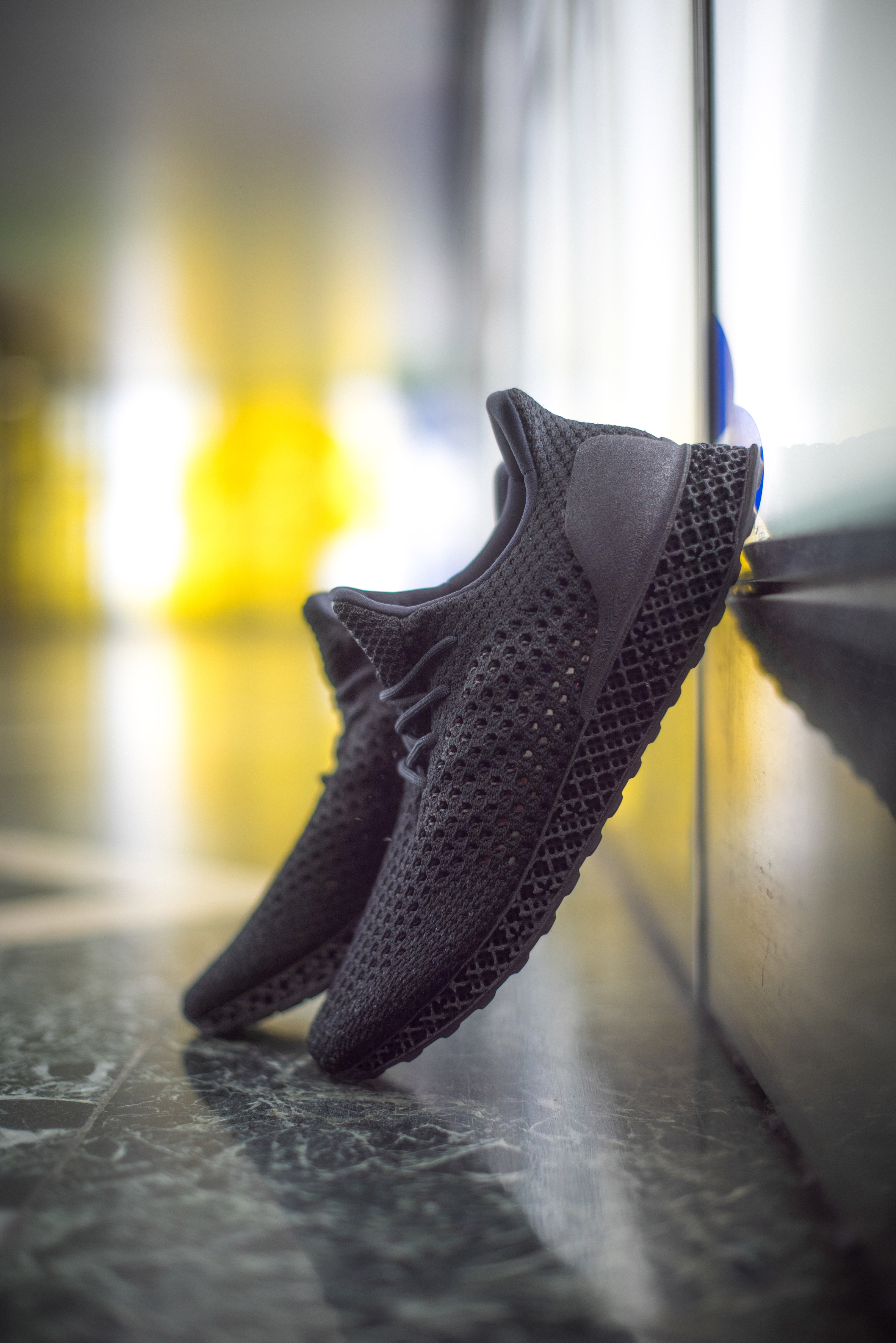 3D-printed Adidas trainers go on