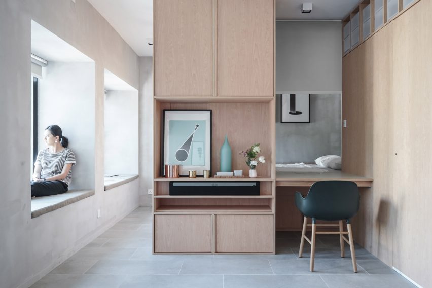 An apartment divided by cabinetry