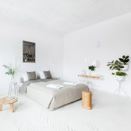 Projekt Praga transforms historic brewery in Poland into minimal apartments