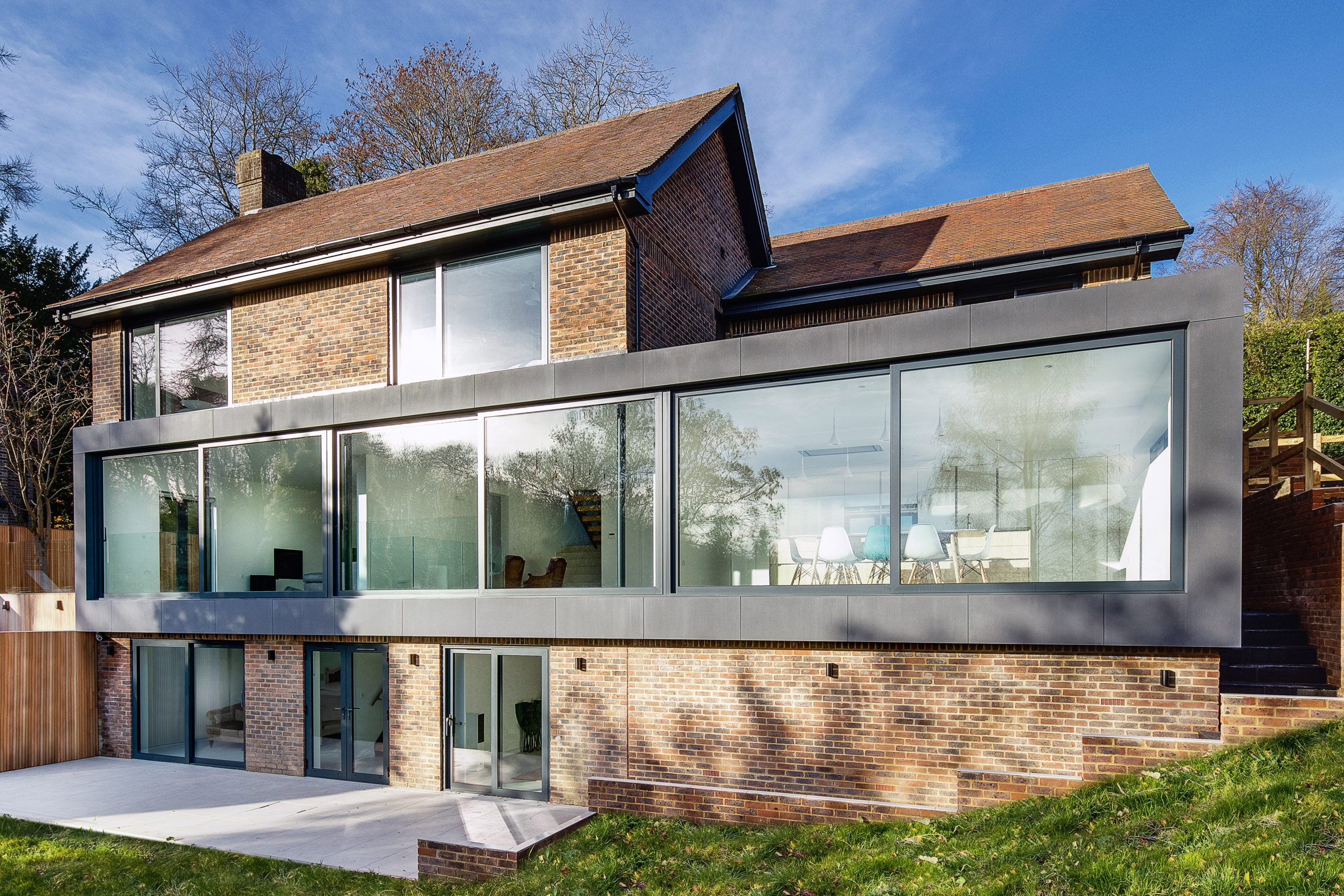 AR Design Studio adds glazed extensions to 1970s house in southern England