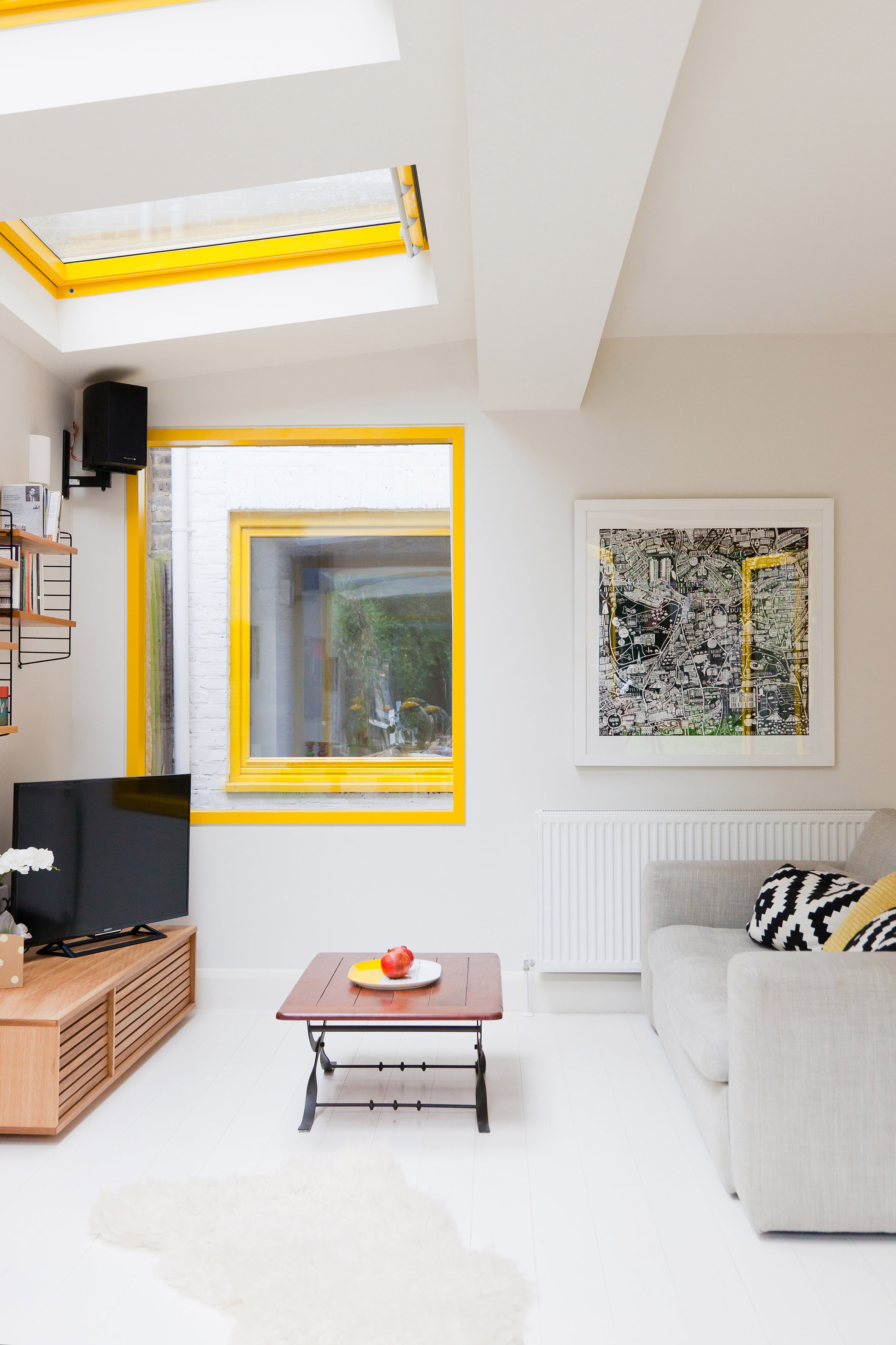 colourful window frames in Yellow House by Nimtim Architects