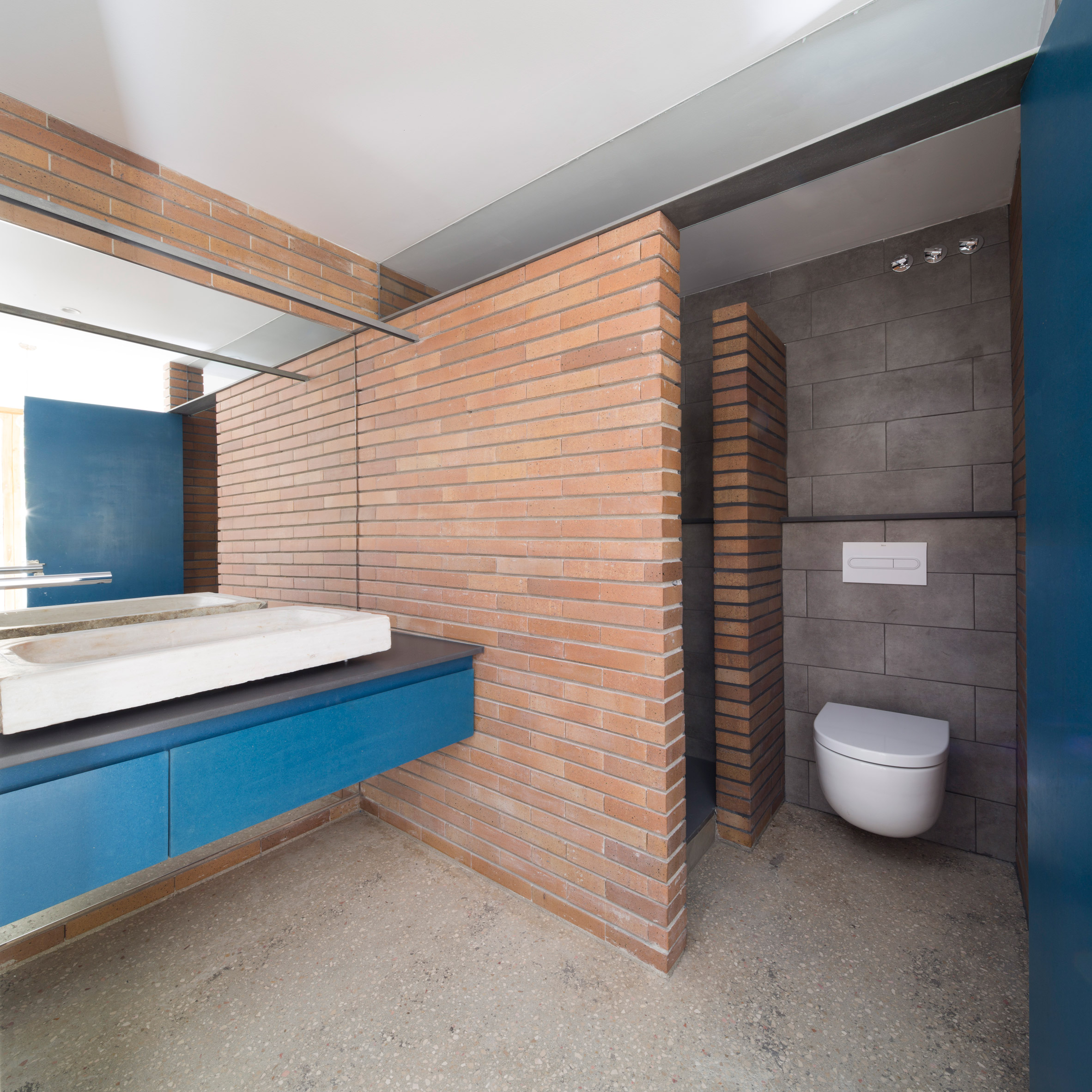 bed-and-blue-nook-architects-interiors-residential-barcelona-spain-spanish-houses-phase-one_dezeen_2364_col_13extra
