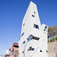 Moon Hoon's narrow Seoul house features small windows and diagonal markings
