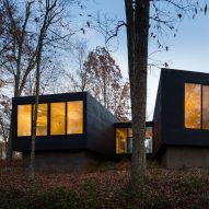 Architecturefirm perches black country home on forested hilltop in Virginia