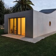 Zinc-covered bump creates double-height kitchen for San Sebastian home