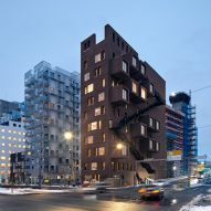 Red-brick boxes pop out of A-Lab's narrow office block on Oslo waterfront