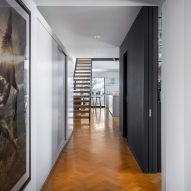 Peart/Weisgerber Residence at Habitat 67 by Moshe Safdie renovated by EMarchitecture First Floor Hall leading to Staircase