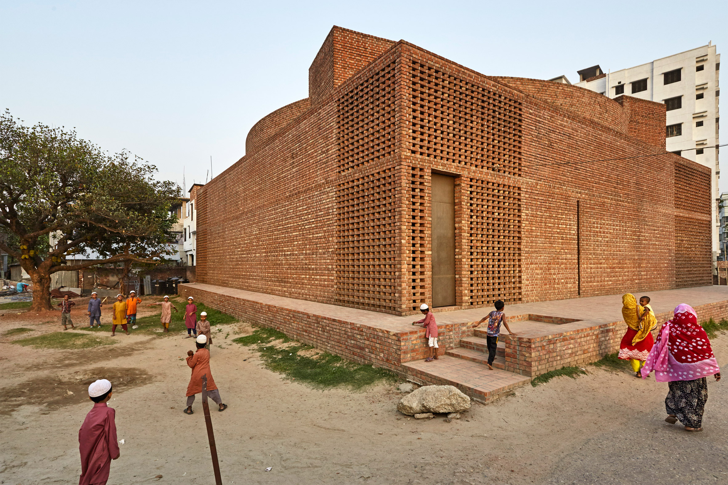 Daylight filters in through the roof and walls of Bangladeshi mosque by Marina Tabassum