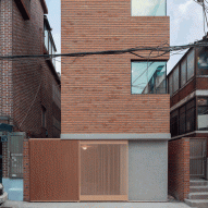 FHHH Friends arranges flexible rooms over split levels in slender Seoul house